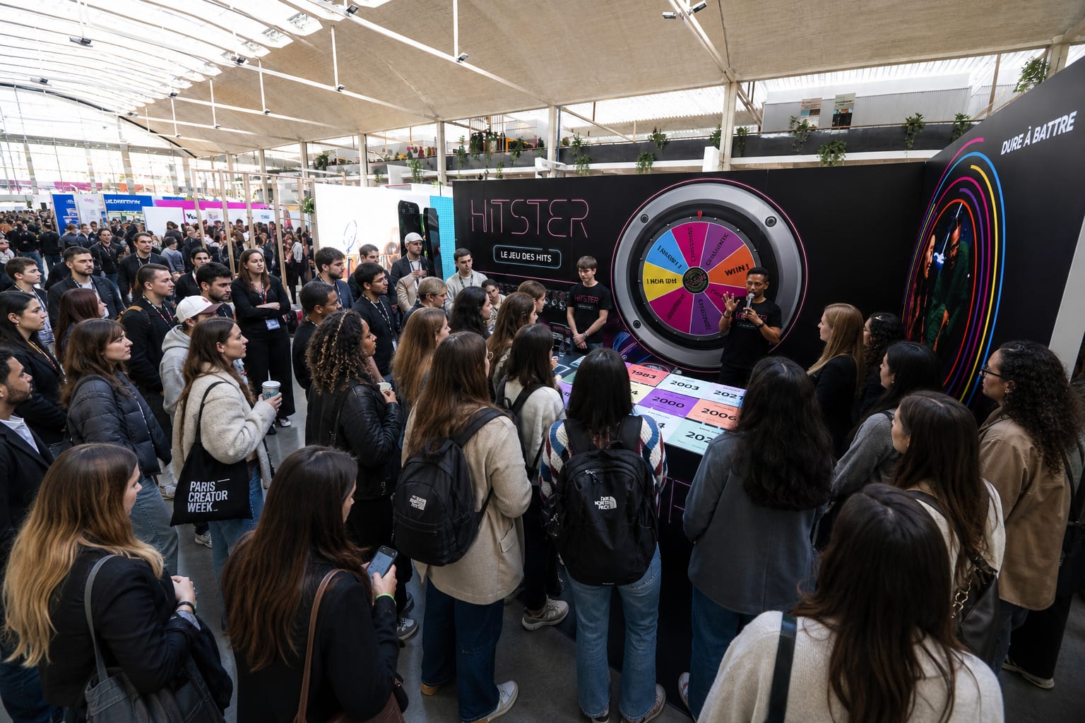 Crowd around the Hitster music game wheel
